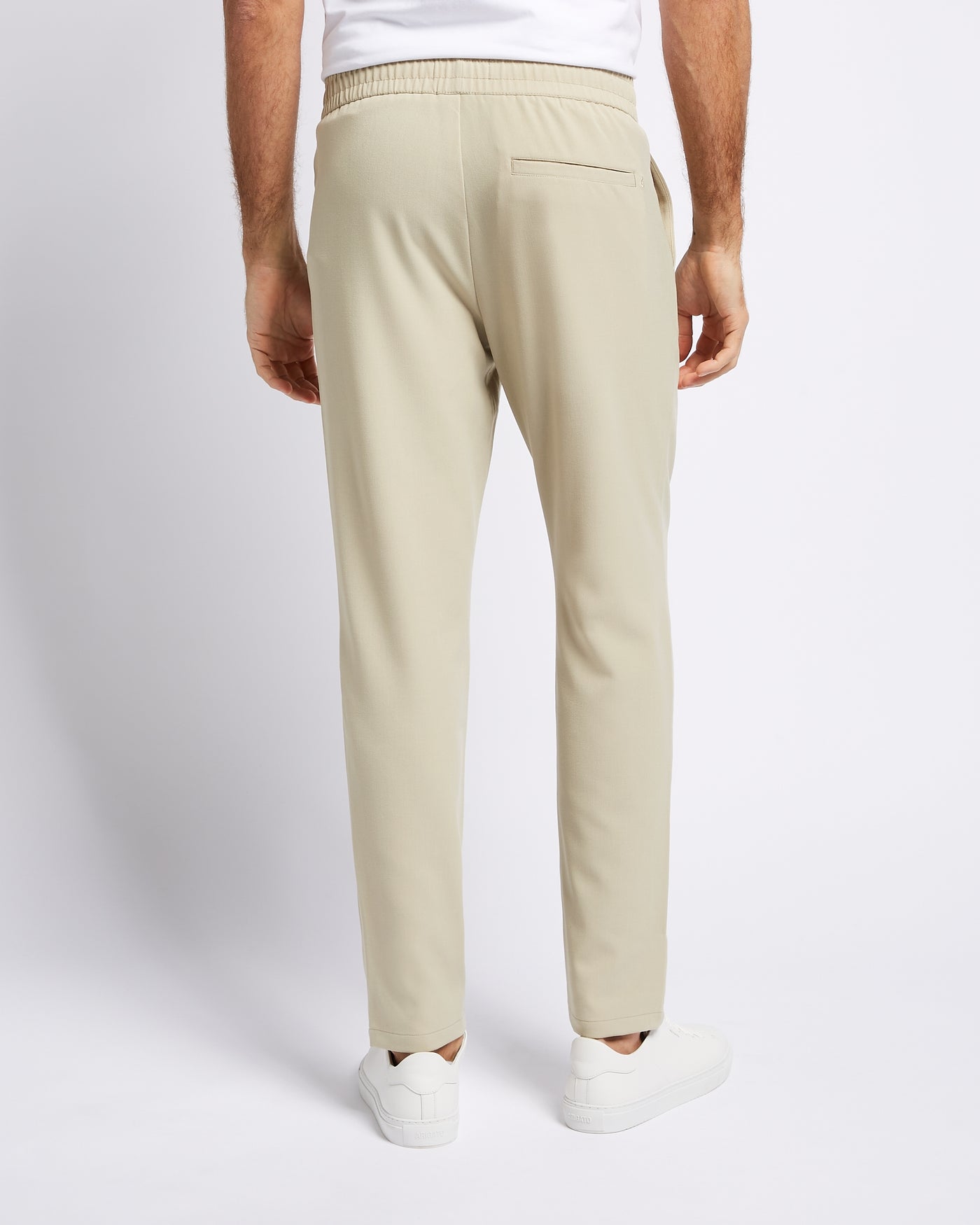 Relaxed Performance trousers Sand